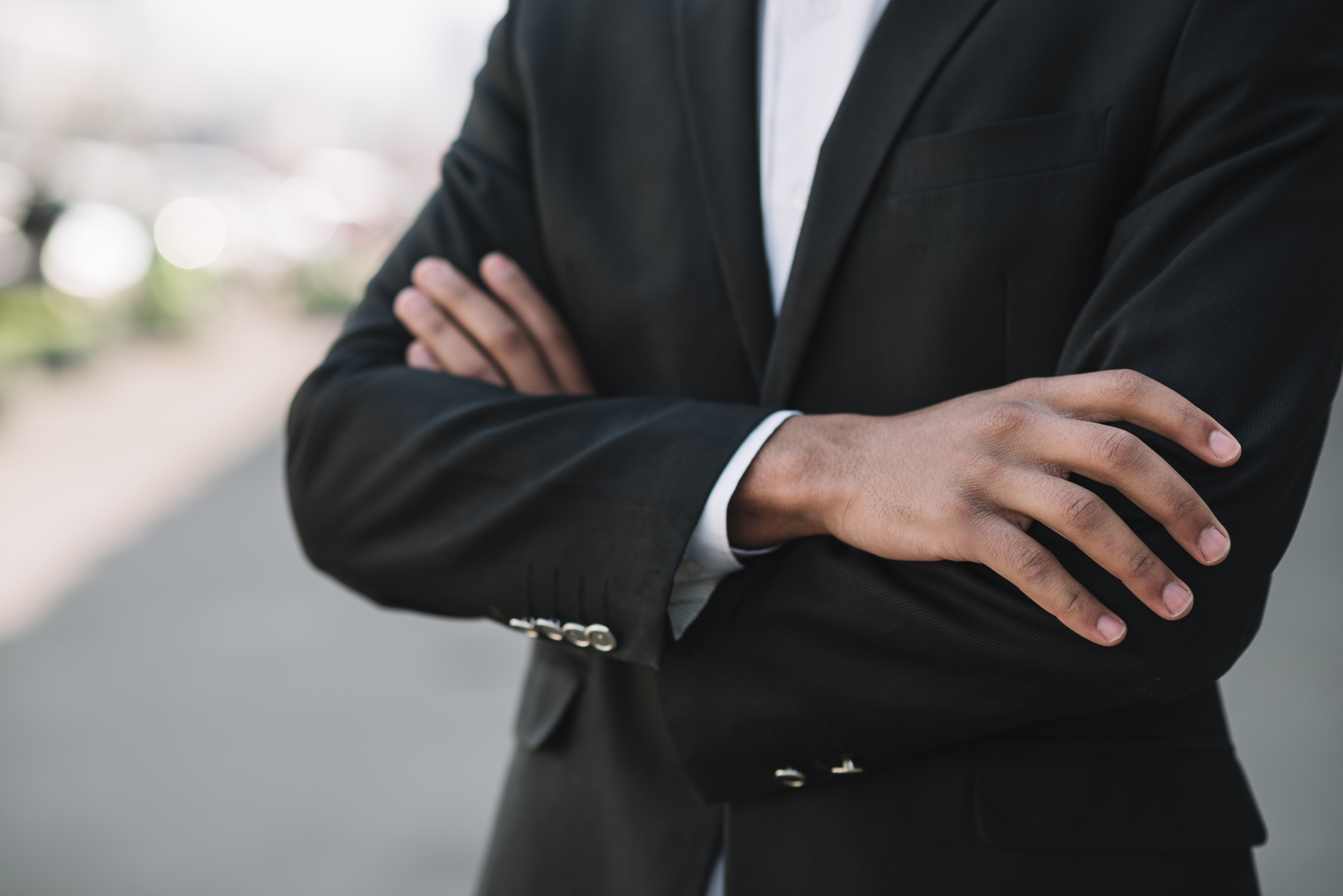 business-employee-with-arms-crossed