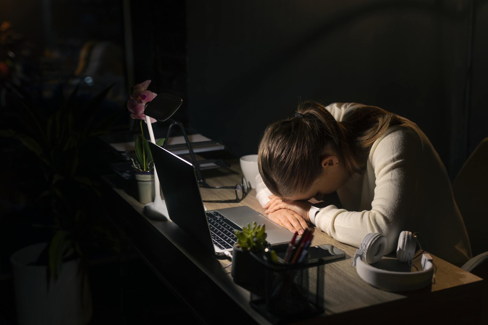 medium-shot-woman-working-late-night